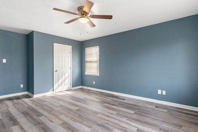 unfurnished bedroom with light hardwood / wood-style floors and ceiling fan