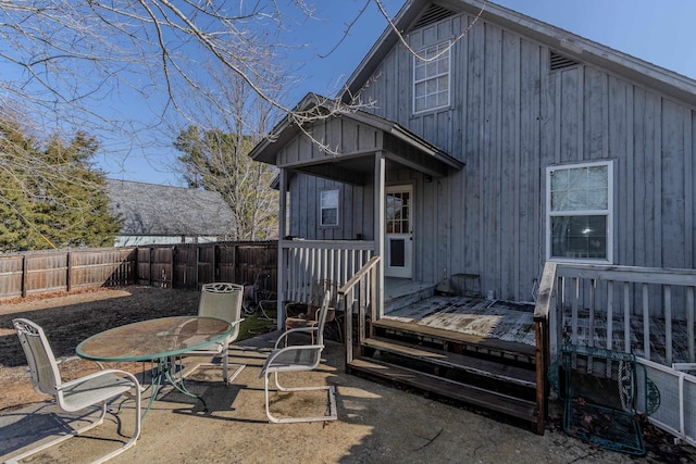 back of property featuring a patio