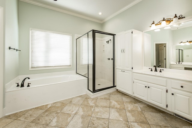 bathroom with tile patterned flooring, vanity, crown molding, and plus walk in shower