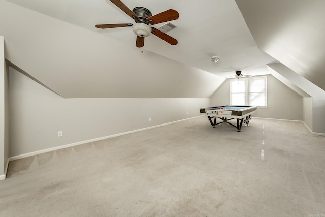 playroom featuring lofted ceiling and light colored carpet