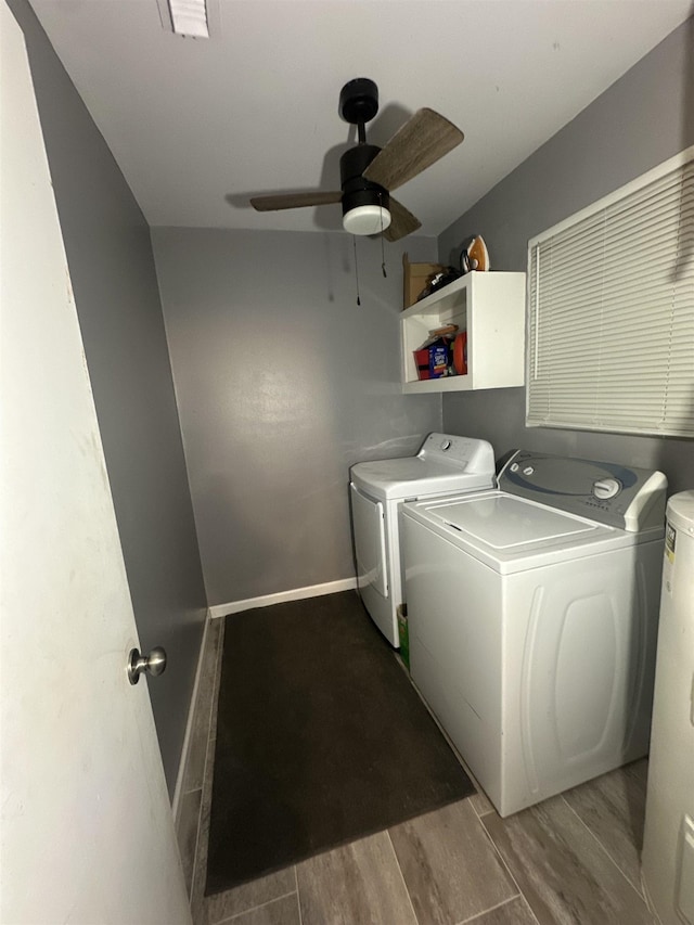 clothes washing area with ceiling fan and washer and dryer