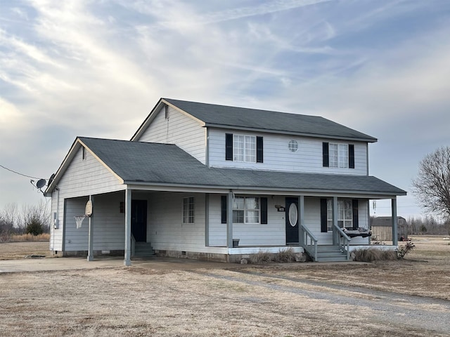 farmhouse inspired home with a porch