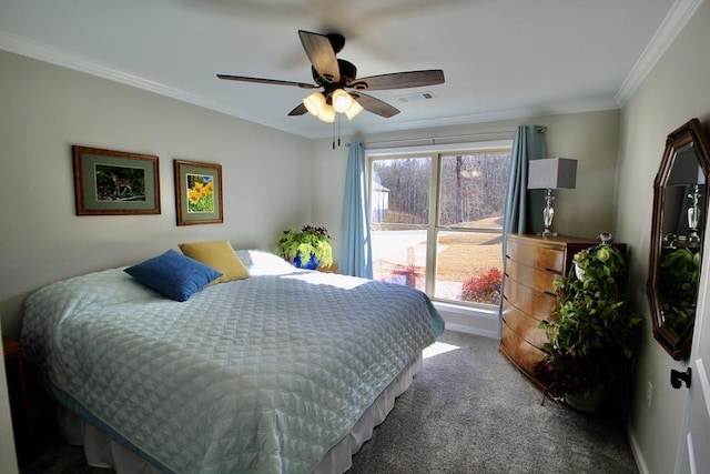 bedroom featuring ornamental molding, carpet flooring, and ceiling fan