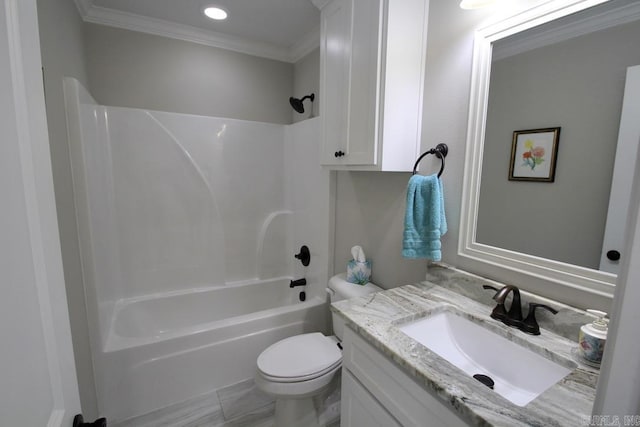 full bathroom featuring vanity, ornamental molding, toilet, and washtub / shower combination