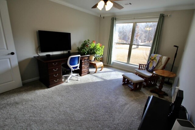 office with crown molding, carpet floors, and ceiling fan