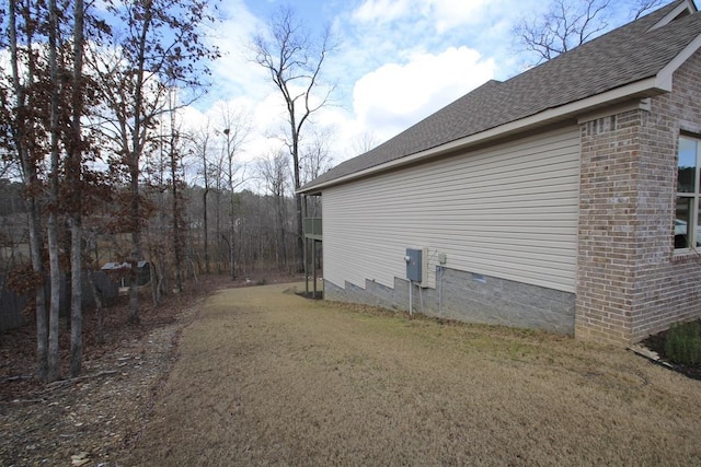 view of property exterior featuring a yard