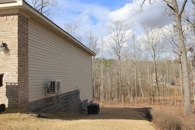 view of property exterior with cooling unit