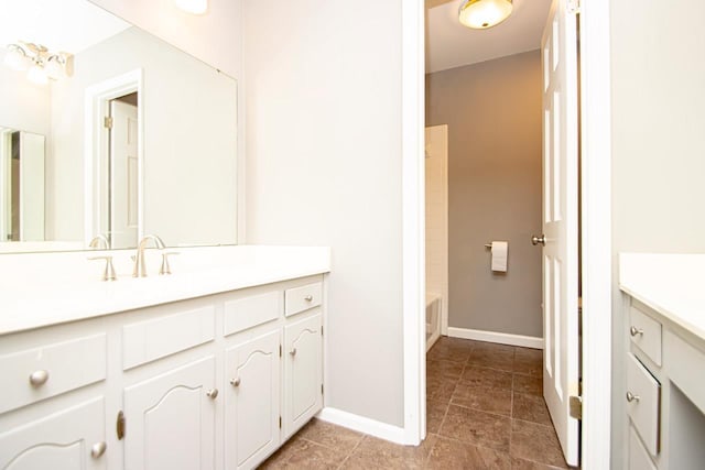 bathroom with vanity and tile patterned floors