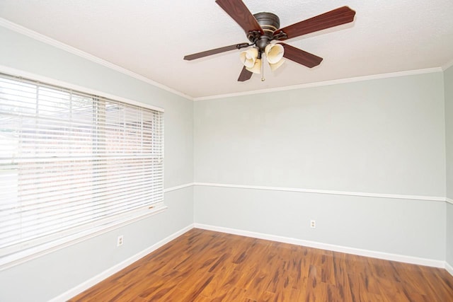 unfurnished room featuring ceiling fan, ornamental molding, wood-type flooring, and a textured ceiling