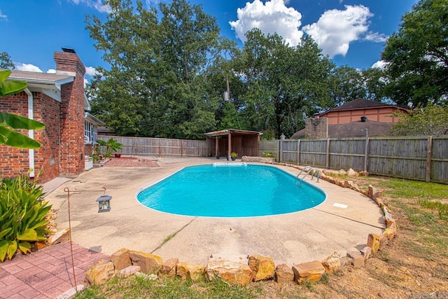 view of pool with a patio area