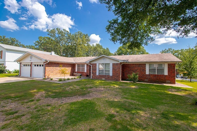 ranch-style house with a garage and a front lawn