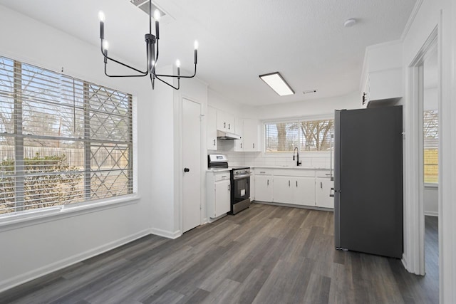 kitchen featuring sink, tasteful backsplash, dark hardwood / wood-style flooring, stainless steel appliances, and white cabinets