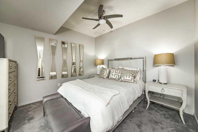 bedroom featuring dark colored carpet and ceiling fan