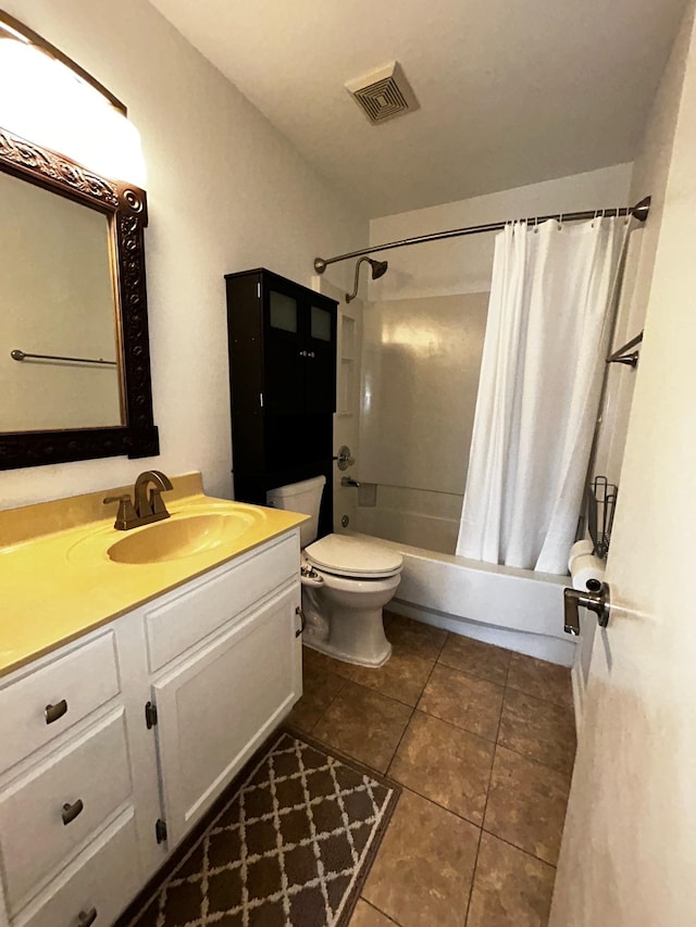 full bathroom with tile patterned floors, toilet, shower / tub combo, and vanity