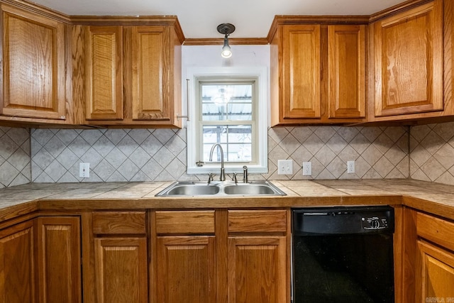 kitchen featuring sink, dishwasher, tile counters, decorative backsplash, and decorative light fixtures