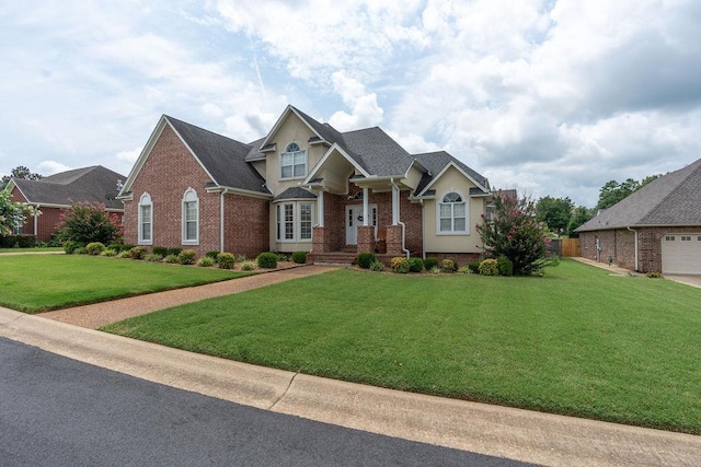 craftsman-style home featuring a front yard