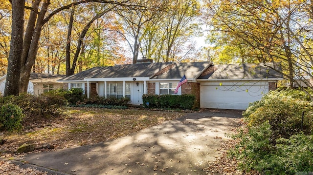 single story home with a garage