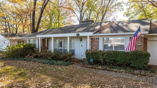 single story home featuring a garage