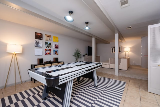 recreation room with light tile patterned floors