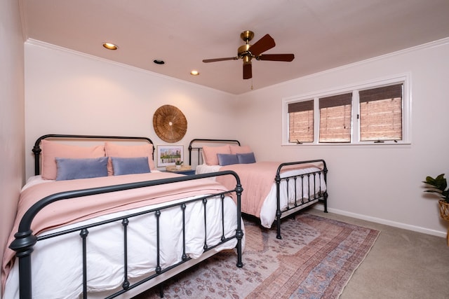 carpeted bedroom with crown molding and ceiling fan