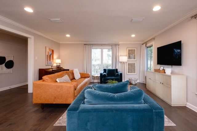 living room featuring ornamental molding, plenty of natural light, and dark hardwood / wood-style floors