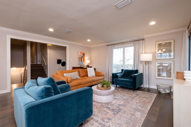 living room with crown molding and dark hardwood / wood-style floors