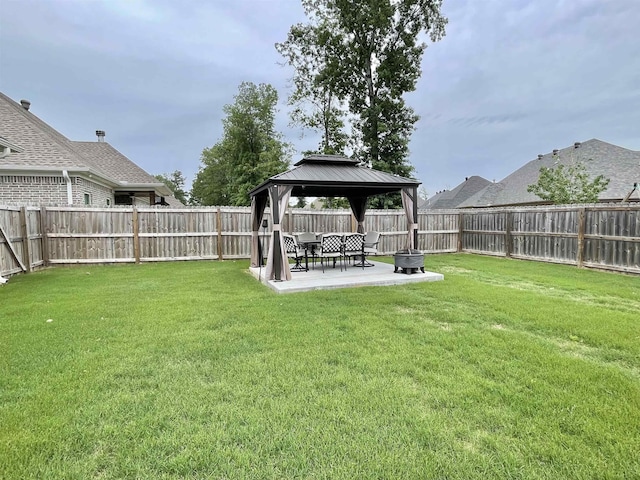 view of yard featuring a gazebo and a patio