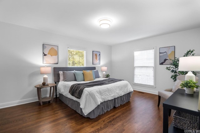 bedroom featuring dark wood-type flooring