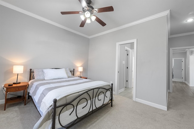 carpeted bedroom with crown molding and ceiling fan