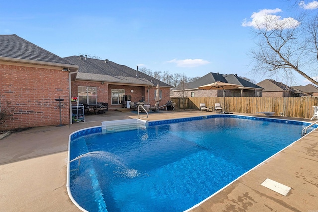 view of pool featuring a patio