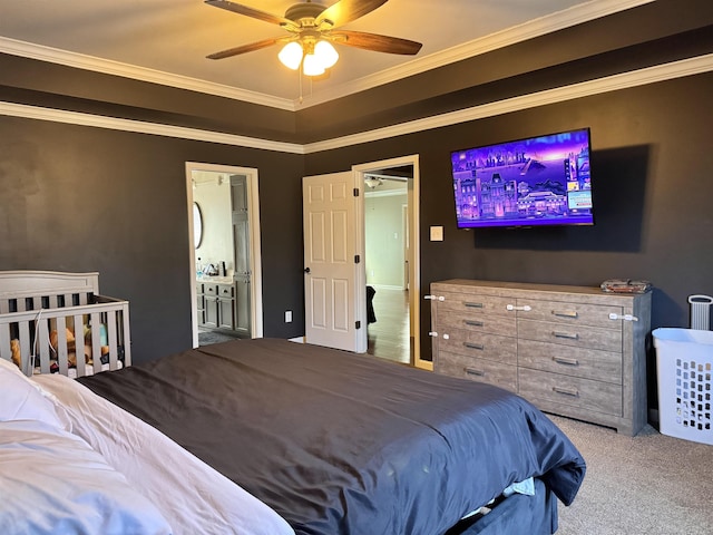 bedroom with ceiling fan, ornamental molding, ensuite bathroom, and carpet floors