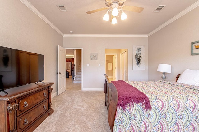 carpeted bedroom with crown molding and ceiling fan