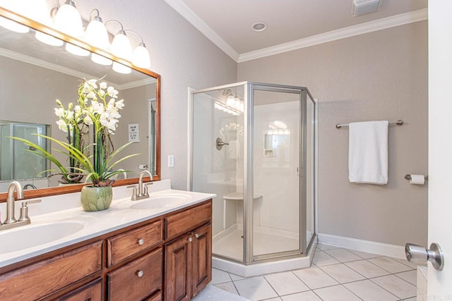 bathroom with walk in shower, ornamental molding, tile patterned floors, and vanity