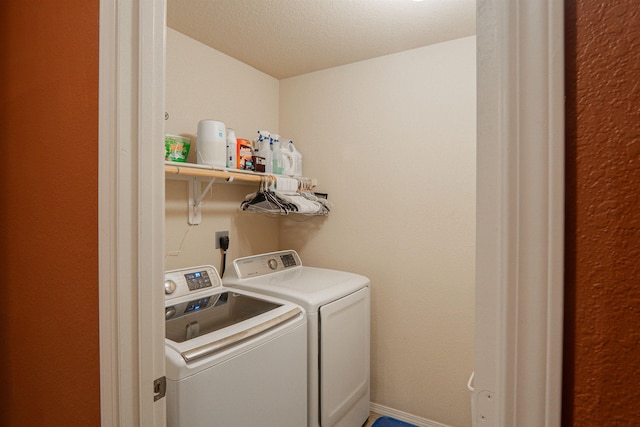 laundry room with separate washer and dryer