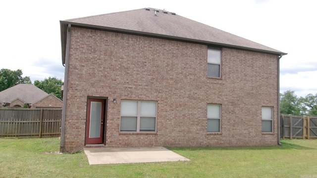 14465 Skyline Dr, Alexander, AR 72002 - back of house featuring a patio, brick siding, and roof with shingles