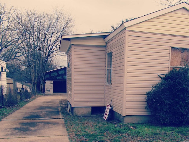 view of property exterior at dusk