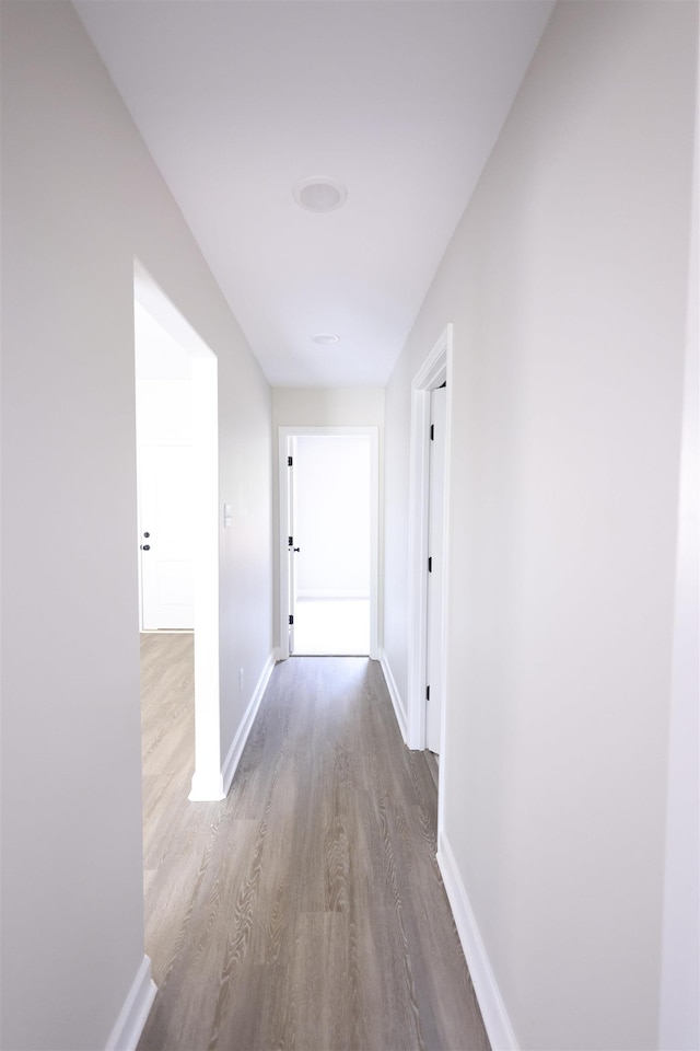 corridor featuring light hardwood / wood-style flooring