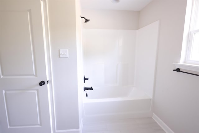 bathroom with shower / bathing tub combination