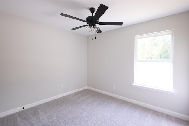 unfurnished room featuring carpet floors and ceiling fan