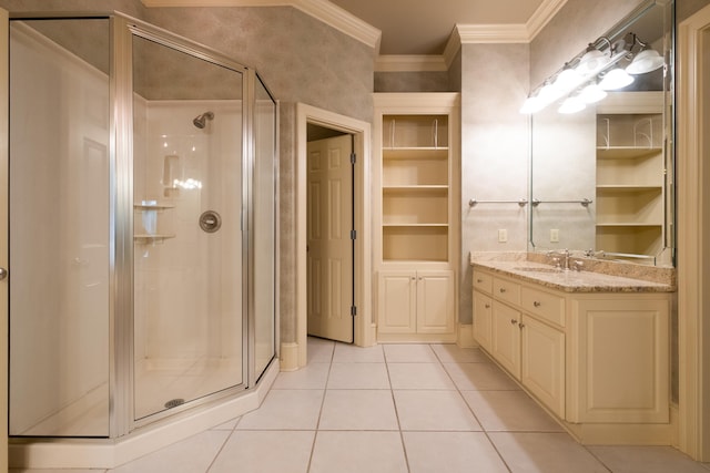 bathroom featuring crown molding, a shower with shower door, built in features, and tile patterned floors