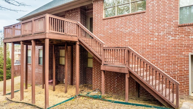 property entrance with a wooden deck