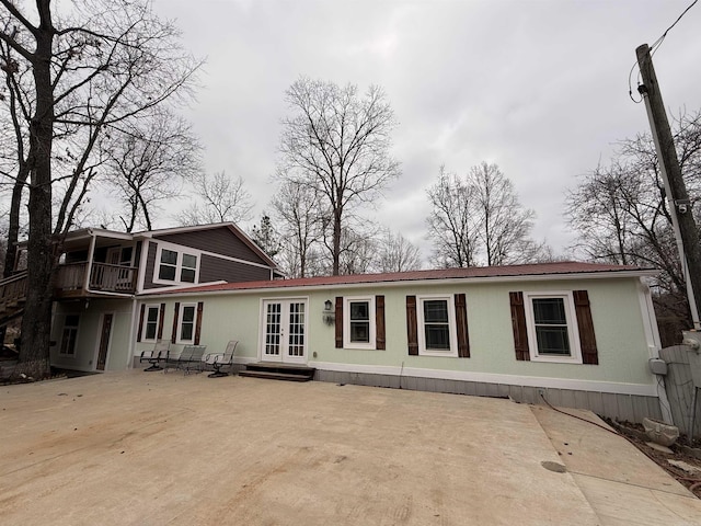 back of property with french doors