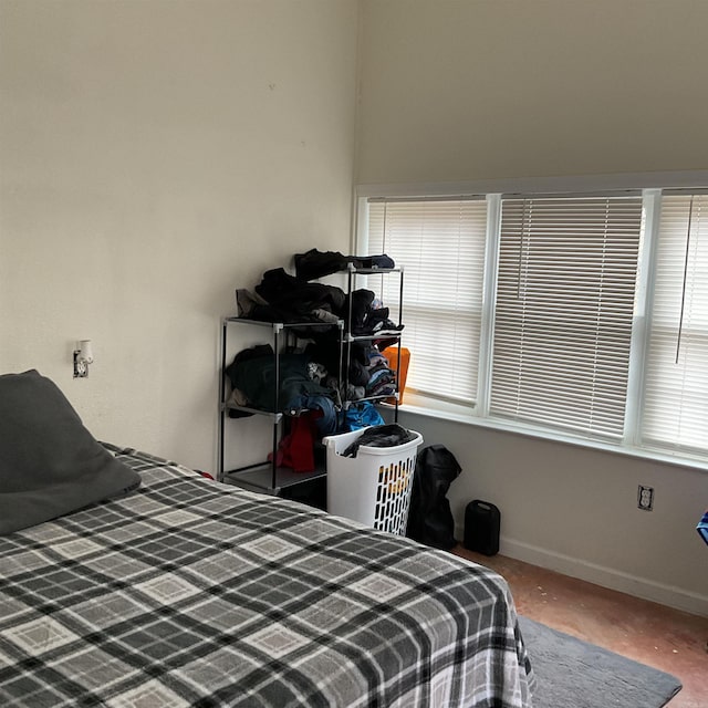 bedroom featuring multiple windows