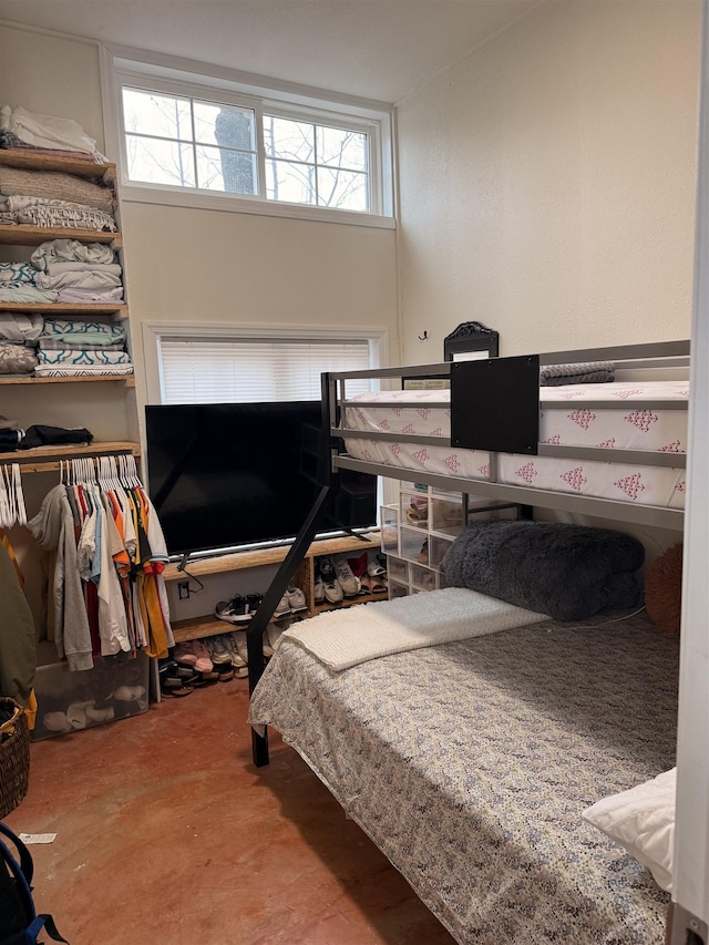 bedroom with concrete floors