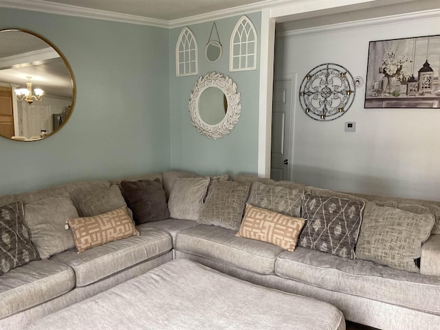 living room with ornamental molding and an inviting chandelier