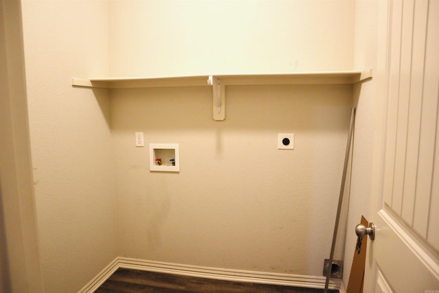 clothes washing area featuring electric dryer hookup, dark hardwood / wood-style floors, and washer hookup