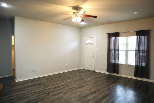 entryway featuring ceiling fan and dark hardwood / wood-style floors