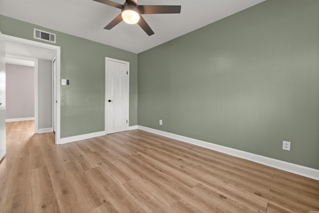 unfurnished bedroom featuring ceiling fan and light wood-type flooring