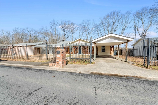 view of front of property with a carport