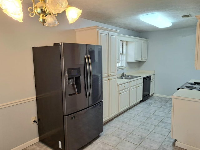 kitchen featuring light tile patterned flooring, sink, an inviting chandelier, stainless steel fridge with ice dispenser, and black dishwasher